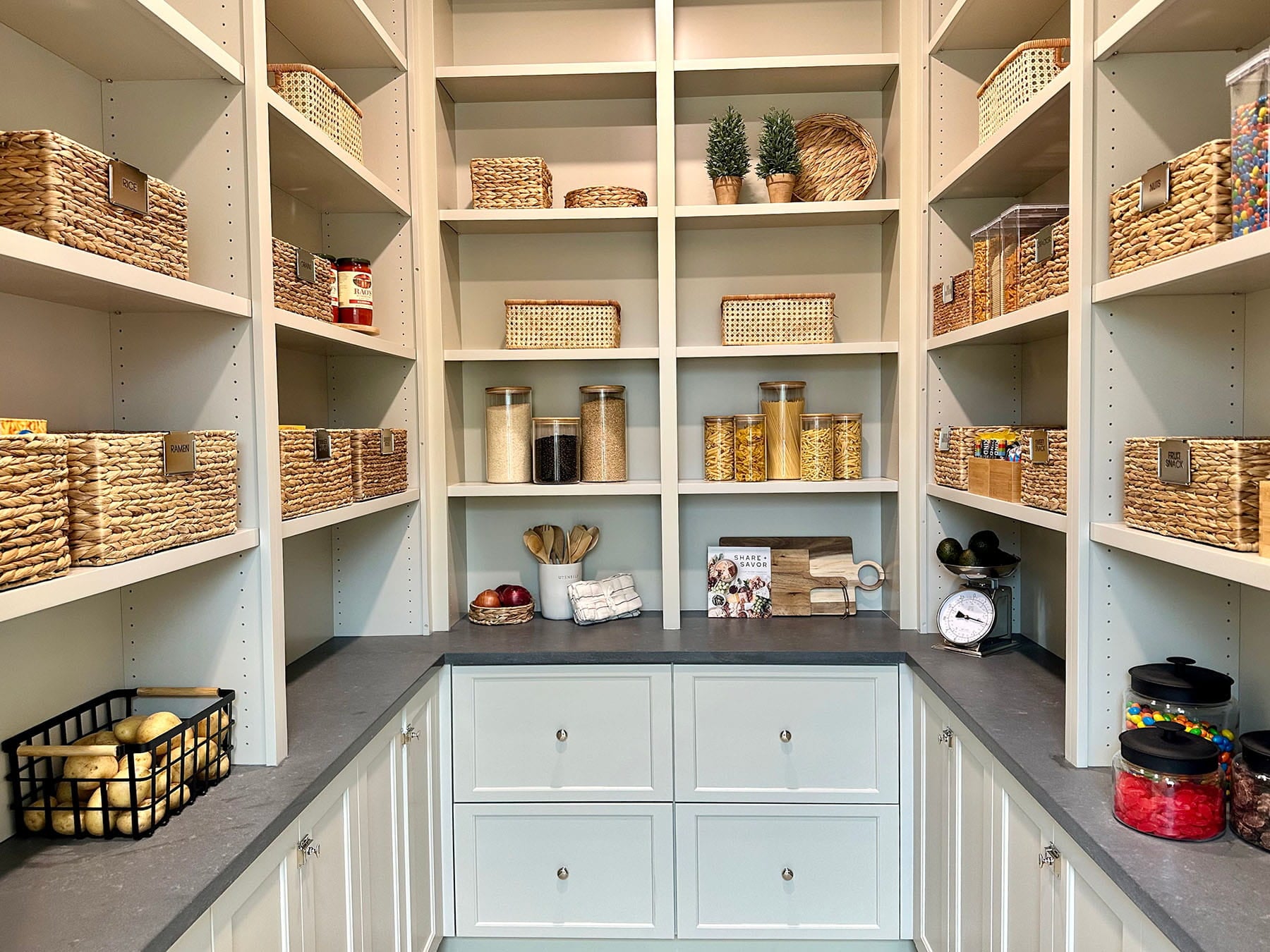 Beautiful pantry shelves organized by Organize Simply home organizing team