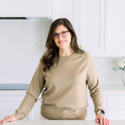 Tracy Bowers, founder of Organize Simply, in a professionally organized home.
