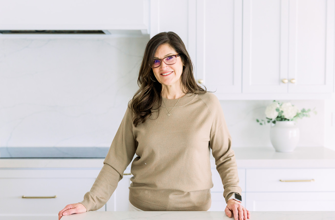 Tracy Bowers, founder of Organize Simply, in a professionally organized home.