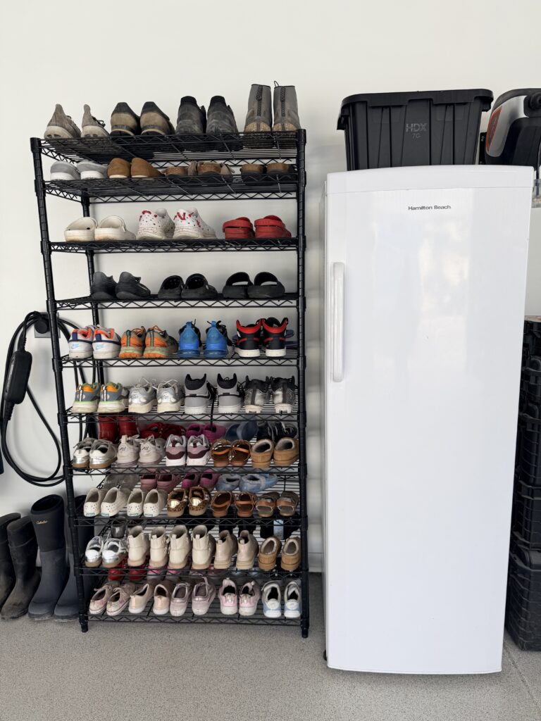 Shoe storage rack with neatly organized family footwear